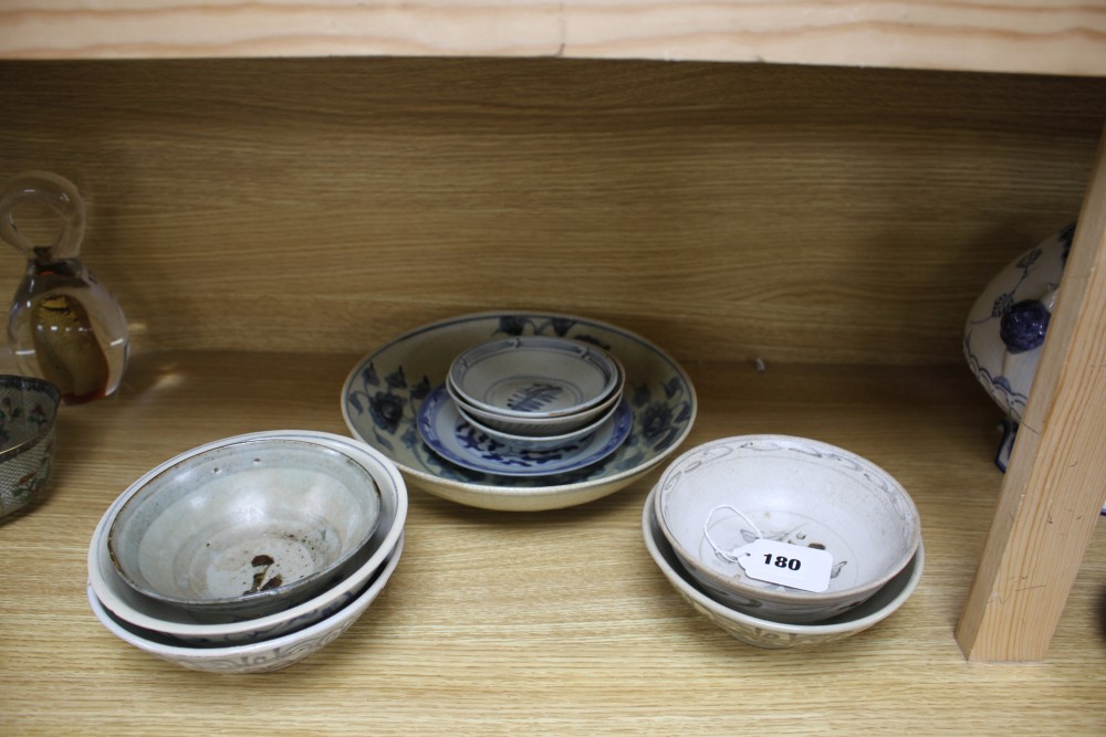 A group of Chinese and Sawankhalok blue and white ceramic bowls and dishes (10)